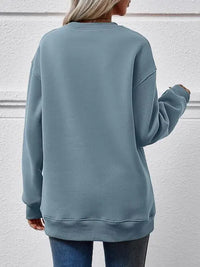 Graphic Round Neck Long Sleeve Sweatshirt Trendsi