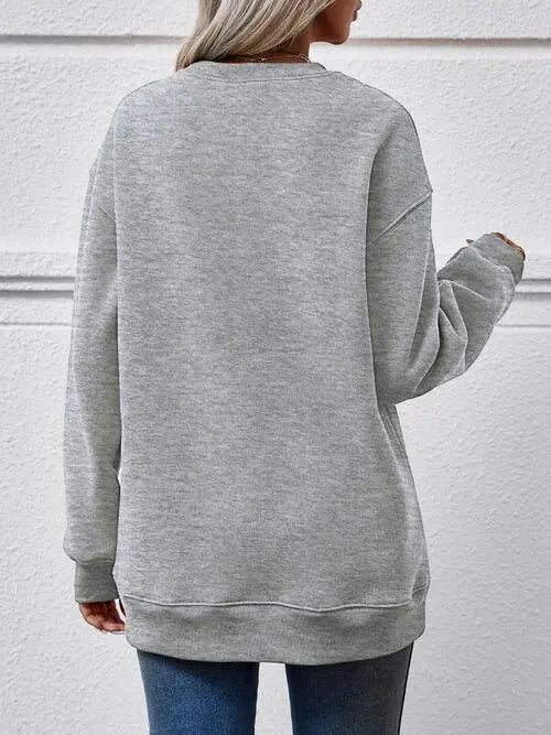 Graphic Round Neck Long Sleeve Sweatshirt Trendsi