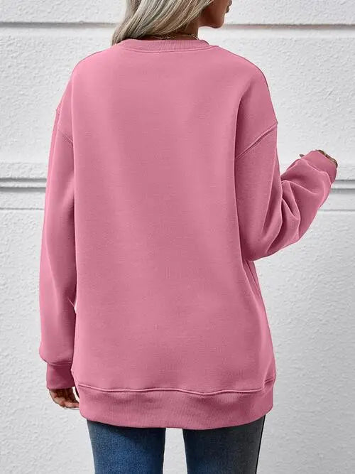 Graphic Round Neck Long Sleeve Sweatshirt Trendsi