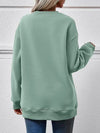 Graphic Round Neck Long Sleeve Sweatshirt Trendsi