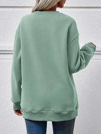 Graphic Round Neck Long Sleeve Sweatshirt Trendsi