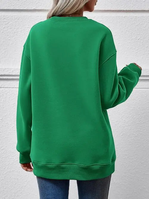 Graphic Round Neck Long Sleeve Sweatshirt Trendsi