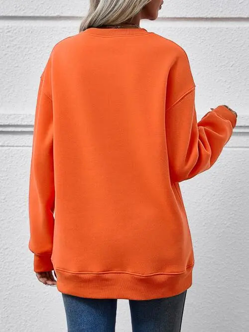 Graphic Round Neck Long Sleeve Sweatshirt Trendsi